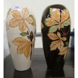 A pair of 1987 Moorcroft pottery vases of tapered baluster form,