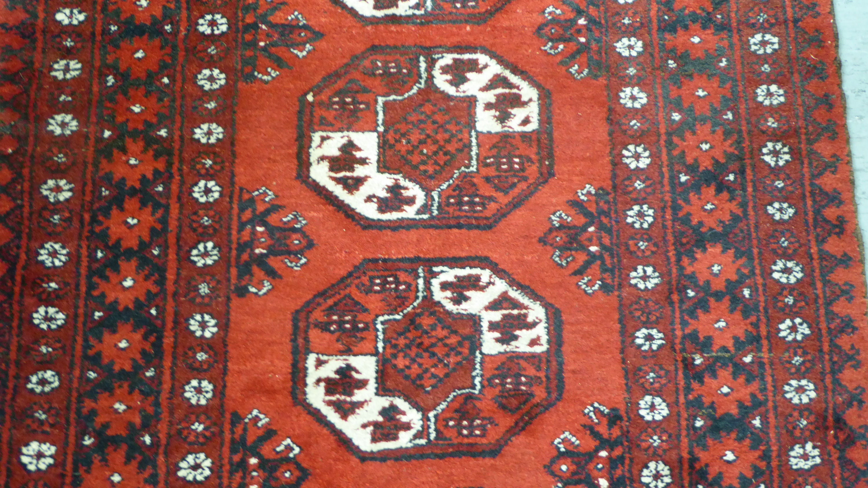 A Bokhara rug with elephant foot motifs, - Image 2 of 3