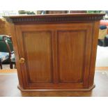 An Edwardian satinwood inlaid mahogany smoker's cabinet with a panelled door,