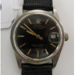 A Rolex Oyster Perpetual Datejust stainless steel cased wristwatch, faced by a black,