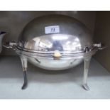 A late Victorian silver plated chafing dish with a rotating domed cover,