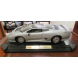 A Maisto diecast model vehicle, a Jaguar XJ220, modelled in 1992,