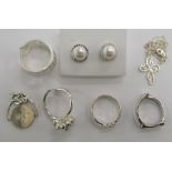 Silver items of personal ornament: to include a spinner charm;