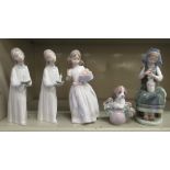 Five Lladro porcelain figures: to include a young woman wearing a nightgown, holding a candle 7.