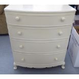 A modern cream painted, bow front, four drawer dressing chest,