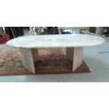 A modern mottled cream/pink marble, oval coffee table, elevated on a box base 15.