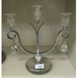 An Art Deco glass and chrome three branch candelabra with prism drops 11''h OS3