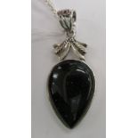 A silver and hardstone set teardrop pendant,