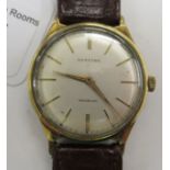 A 1960s Glycine gold plated and stainless steel cased wristwatch, faced by a gilded baton dial,