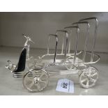 A silver plated novelty four division toastrack,