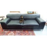 A 1960/70s stitched black hide upholstered box settee with a low level back and arms,