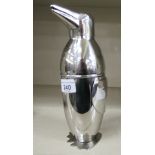 A silver plated novelty cocktail shaker,