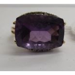 A 9ct gold amethyst and diamond ring 11