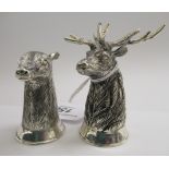 A pair of silver coloured metal novelty salt and pepper pots,