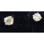 A pair of white gold diamond set stud earrings 11