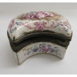 A mid 19thC French enamelled patch box of crescent form,
