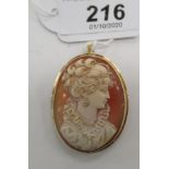 A gold coloured metal oval cameo pendant 11