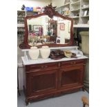 A late 19thC style Continental cherrywood finished dresser, the mottled,