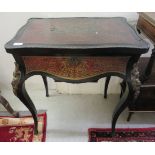 A late 19thC boulleworked table, the hinged top enclosing a mirror and a fitted interior,