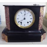 A 1930s marble and slate cased mantle clock;