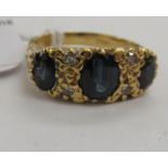 A late Victorian 18ct gold sapphire and diamond ring 11