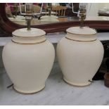 A pair of modern cream coloured and gilded ceramic vase design table lamps 14''h CA