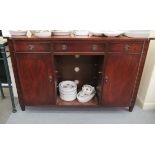A modern crossbanded mahogany finished sideboard with curved ends,