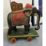 A 20thC Indian, painted and carved wooden model elephant,