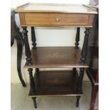 A late 19thC marquetry rosewood etagere with a brass gallery and frieze drawer, raised on turned,