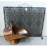 Hearth related items: to include a late Victorian copper helmet shaped coal scuttle 16''h F