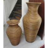 Two modern woven cane bound vases 21'' & 34''h BSR