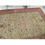 A Louis de Poortere rug with floral decoration,
