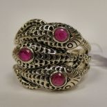 A silver snake ring,