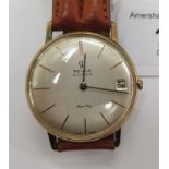 A 1960s Vertex Rotor King gold plated and stainless steel cased wristwatch, faced by a baton dial,