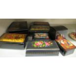 Four various Russian black lacquered papier mache boxes,