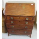 A George III mahogany bureau with a fall flap, over four graduated long drawers,