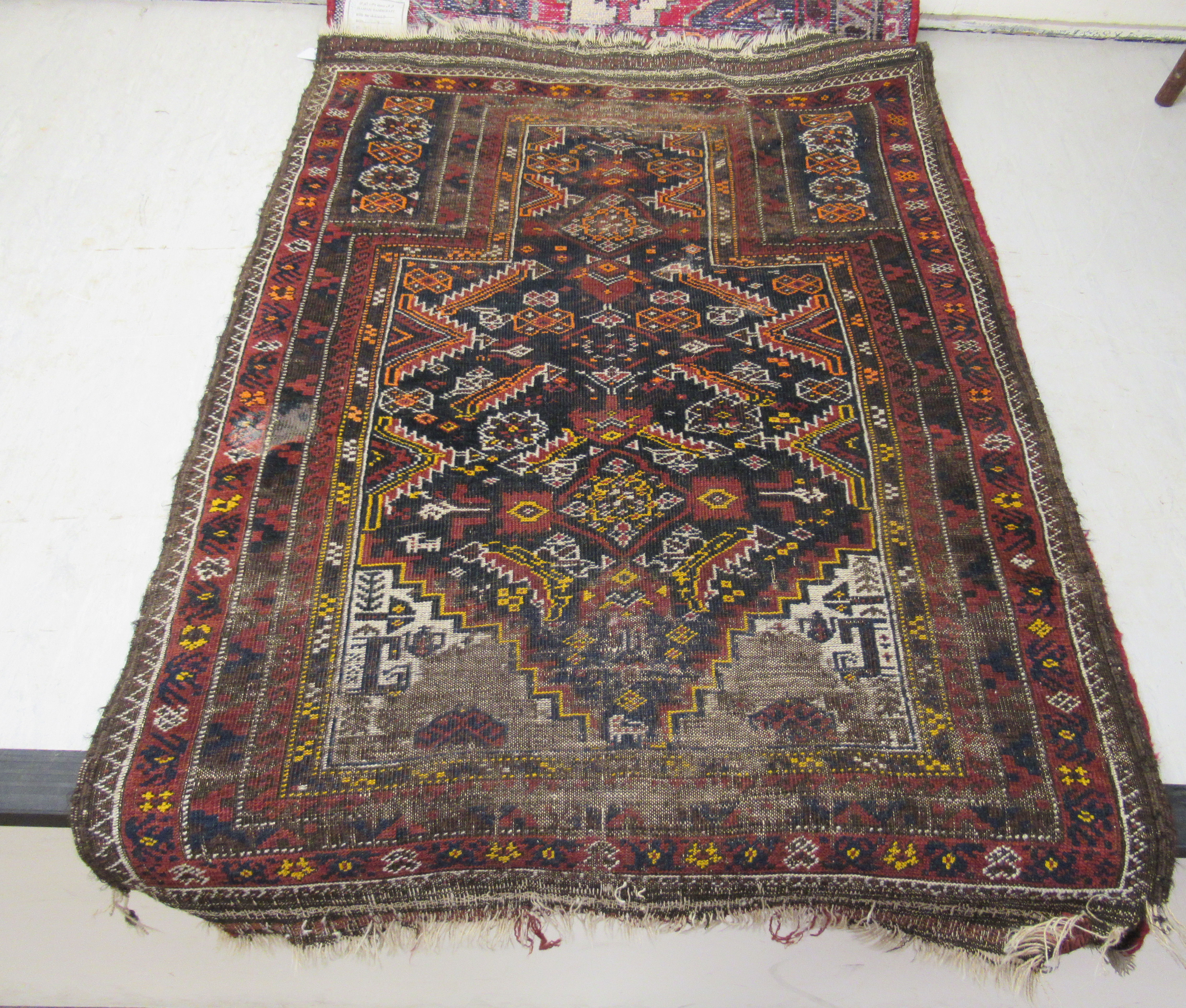 Five small Persian and other rugs, decorated in various styles, - Image 5 of 6