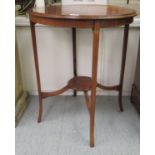 An Edwardian string inlaid mahogany occasional table, raised on slender square legs,