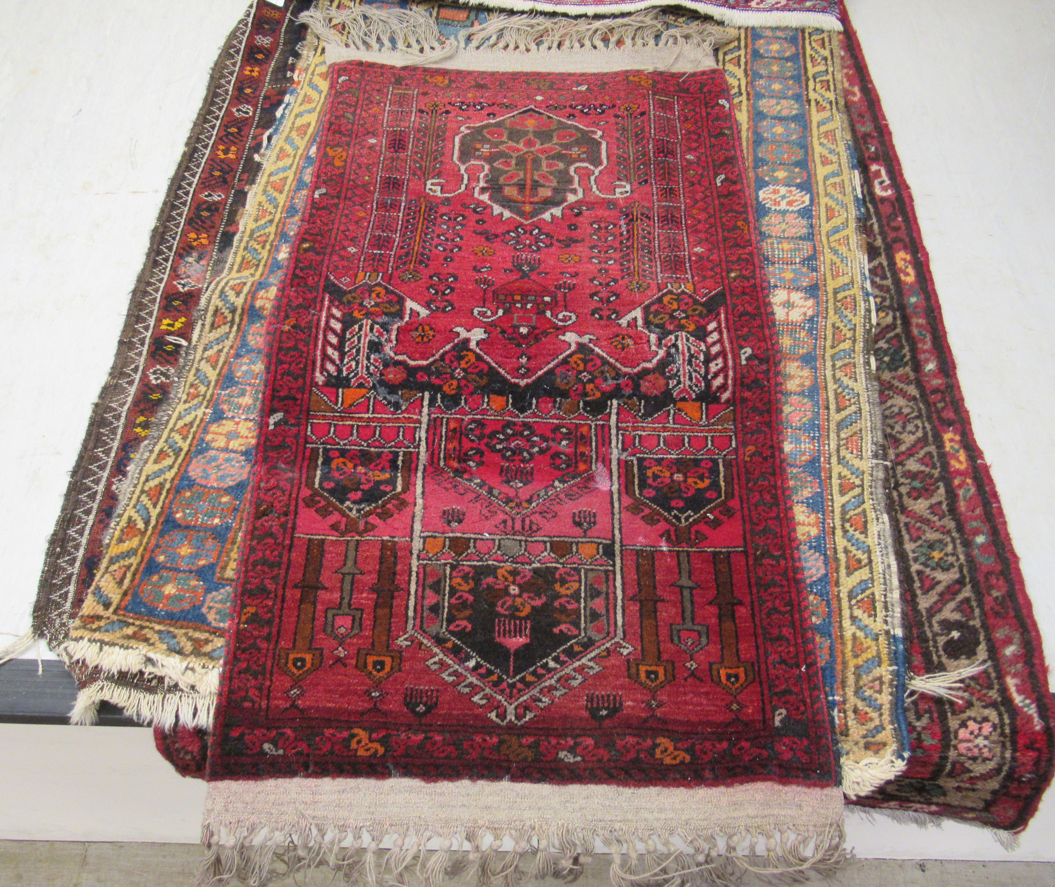 Five small Persian and other rugs, decorated in various styles, - Image 3 of 6