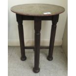 An early/mid 20thC brass tray top occasional table, raised on reeded legs,