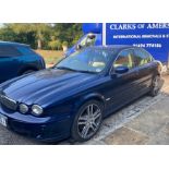 A 2005 Jaguar X-Type Sovereign four door automatic saloon, petrol 2967cc, in blue livery, reg.no.