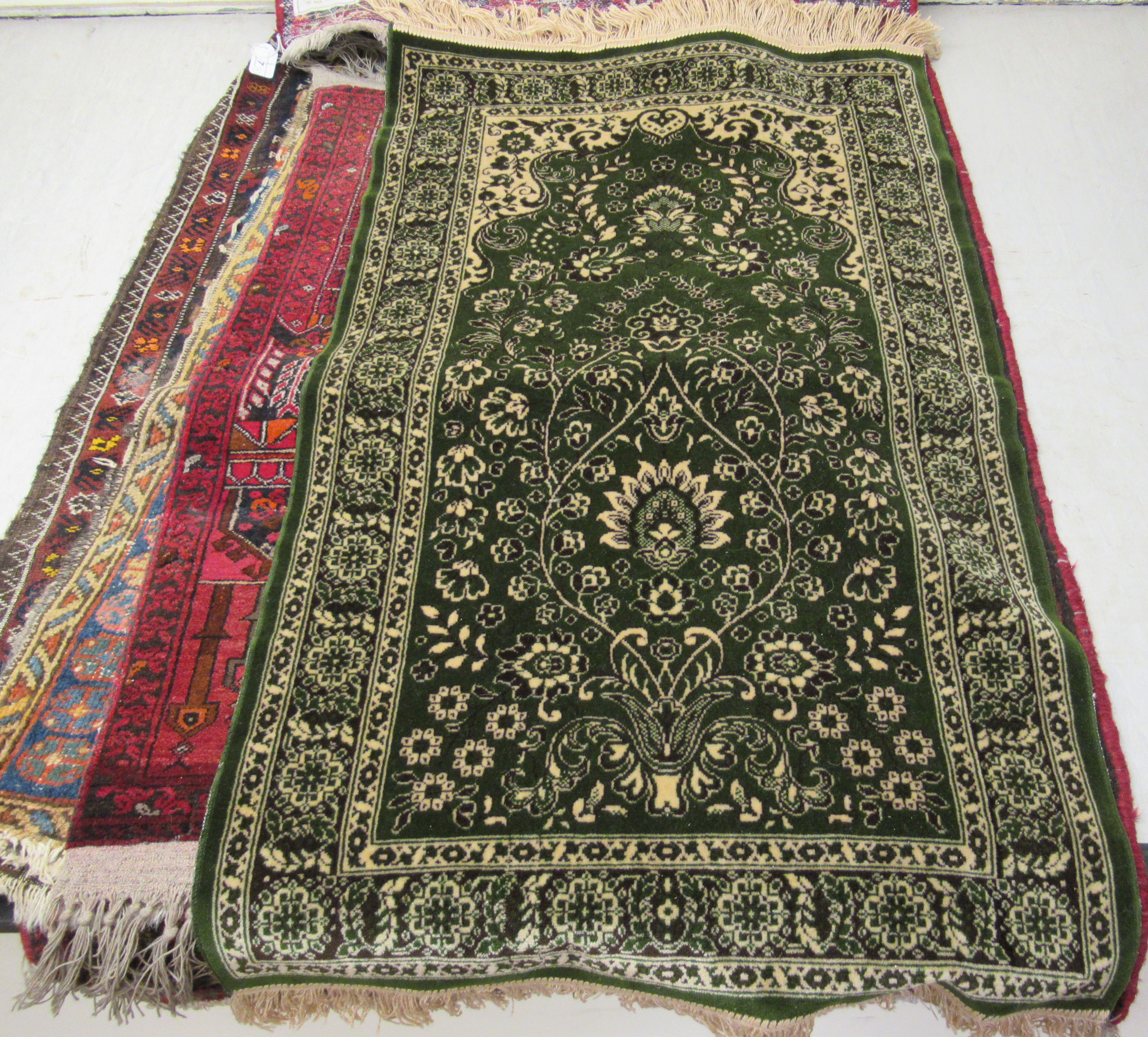 Five small Persian and other rugs, decorated in various styles, - Image 2 of 6