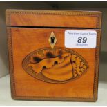 A Regency satinwood tea caddy, the lid and front decorated with shell marquetry 5''h 4.