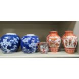 Oriental collectables: to include a pair of early 20thC Kutani porcelain vases and covers 6''h