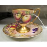 A Royal Worcester china matched pedestal coffee cup and saucer,