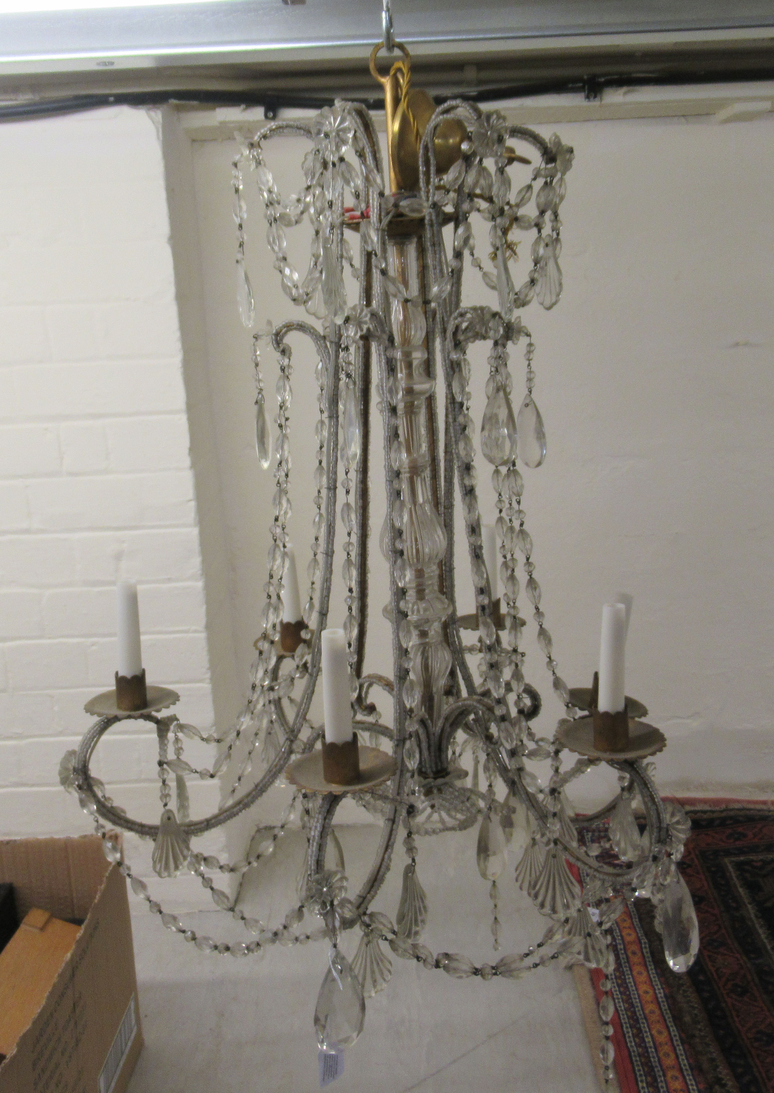 A Continental cut crystal bead and pendant six branch chandelier with candle style fittings approx.