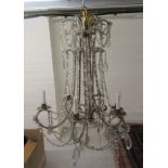 A Continental cut crystal bead and pendant six branch chandelier with candle style fittings approx.