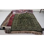 Five small Persian and other rugs, decorated in various styles,