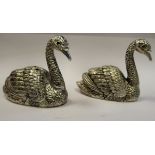 A pair of silver plated swan design salt and pepper pots OS10