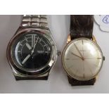 A 1950/60s Doxa gold plated and stainless steel cased wristwatch, faced by a baton dial,